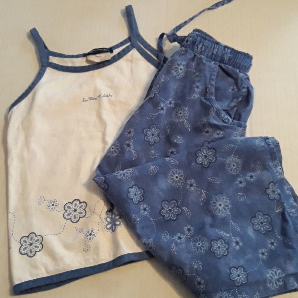 A Girls Antique Shirt and Skirt Outfit